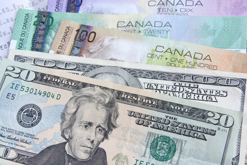 Image of Canadian and U.S. dollars to underline that a Canadian web developer like Selaris Media offers companies in the United States exceptional savings on website design, copy writing, SEO and web application development. 