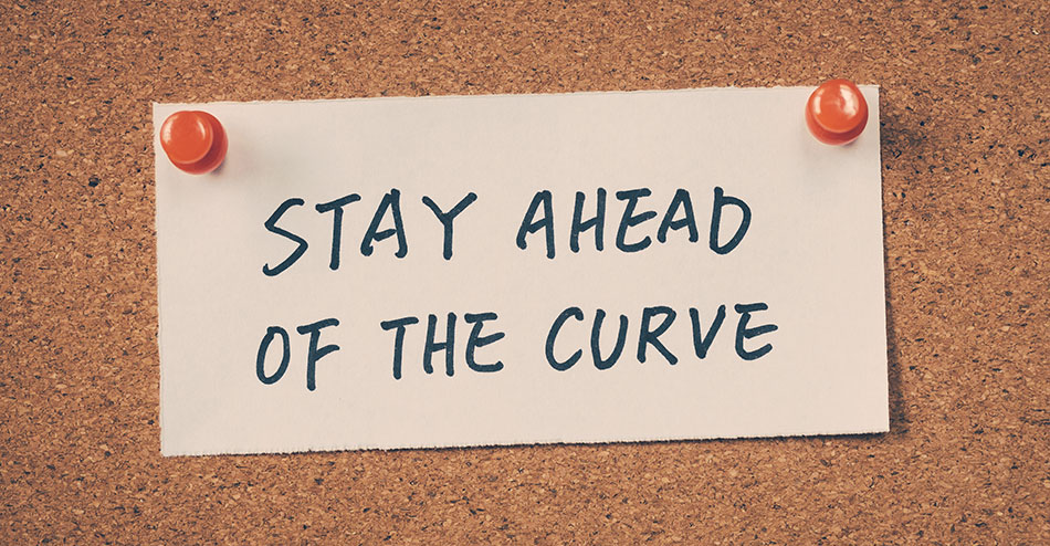 photo of a corkboard with a message to 'stay ahead of the curve', meaning you should always implement best practices for your website to maintain good page rankings and avoid penalties for black hat SEO techniques